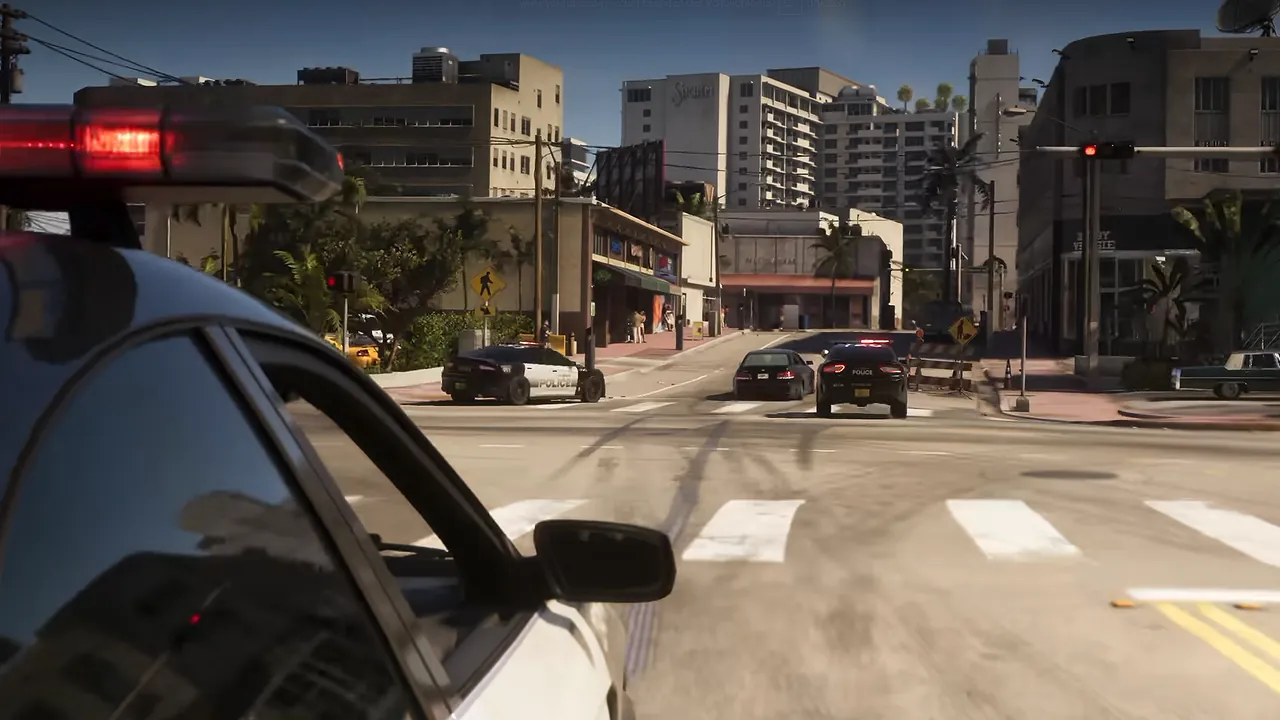 Several police cars with flashing lights near a sunlit city intersection in GTA VI.