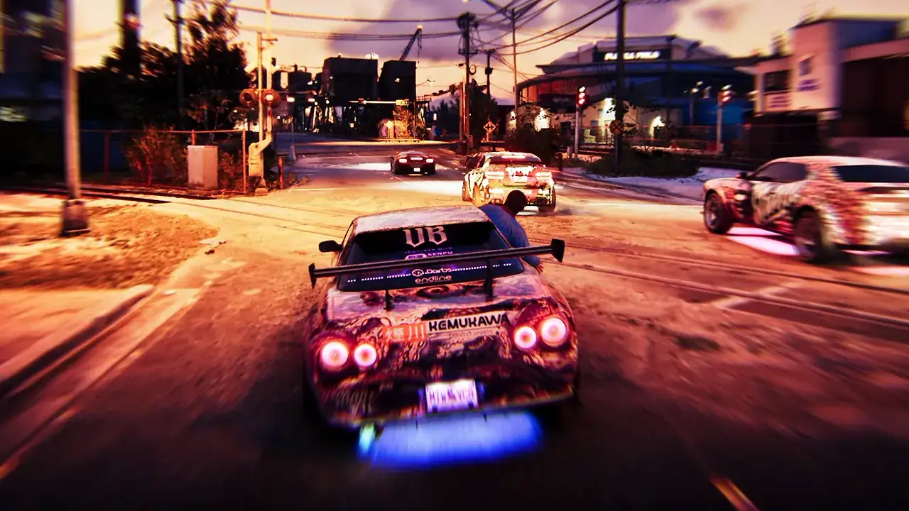 Customized cars race along a street at sunset, with a blue exhaust flame behind the nearest car in GTA VI.